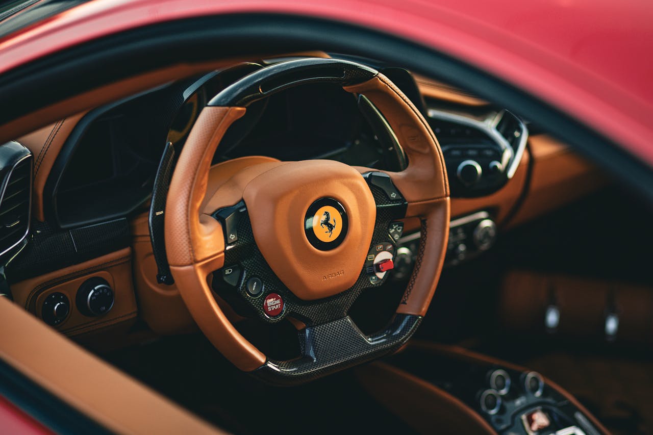 our-journey-03 luxury-sports-car-interior-with-leather-trim-35084092